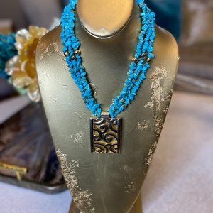 Turquoise chip multi strand gold medallion necklace